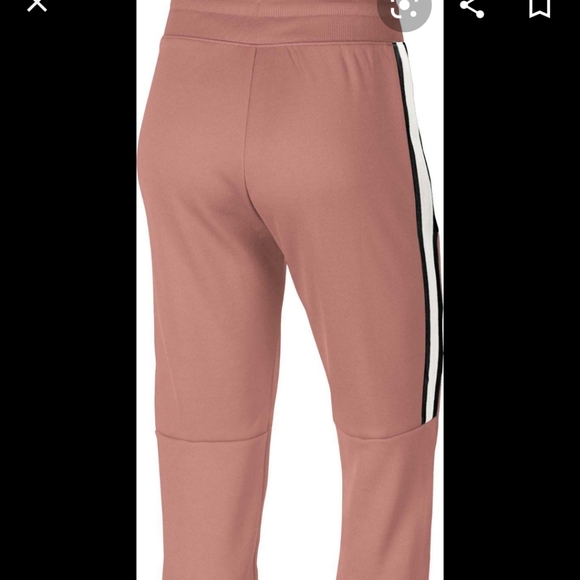 nike women's sportswear tracksuit joggers rust pink